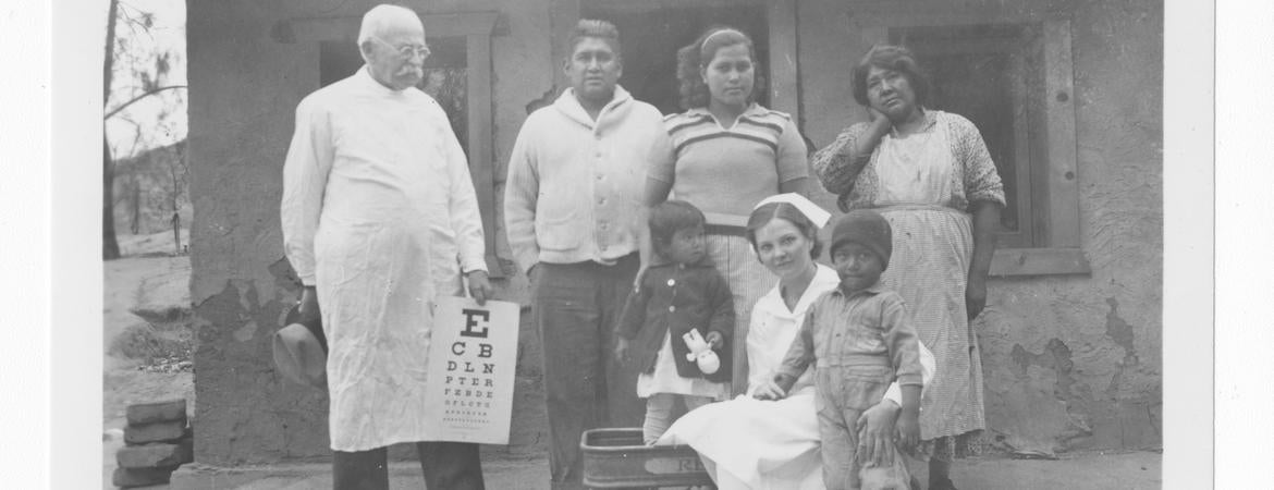 Dr. Evans and Nurse with people